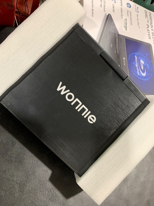Photo 1 of WONNIE 16.9" Portable Bluray DVD Player with 14.1" 1080P Full HD Large Swivel Screen, Surround Sound, 4 Hrs Rechargeable Battery, Support Last Memory, HDMI Out, AV in, USB/SD Card, Sync TV