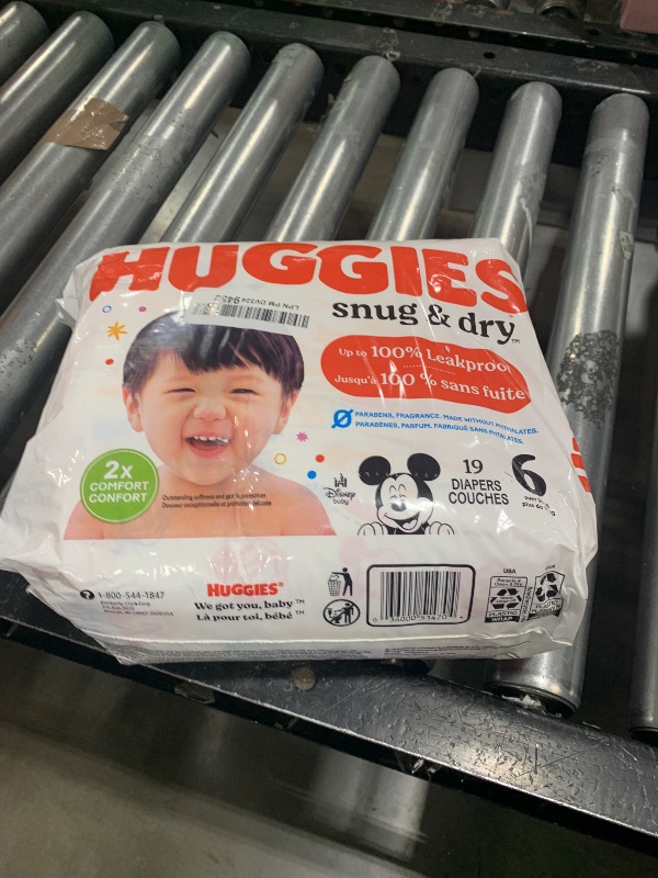 Photo 1 of Huggies Size 6 Diapers, Snug & Dry Baby Diapers, Size 6 (35+ lbs), 19 Count, Packaging May Vary