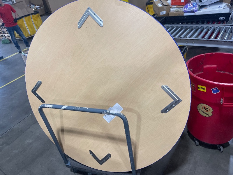 Photo 1 of 5 ft round table ( table only)
