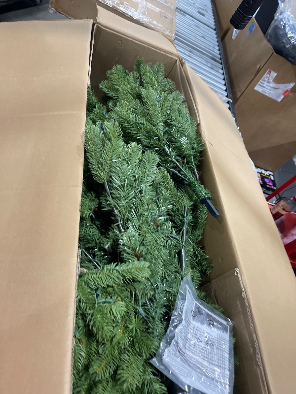 Photo 1 of National Tree Company Pre-Lit 'Feel Real' Artificial Full Downswept Christmas Tree, Green, Douglas Fir, Dual Color LED Lights, 7.5 feet