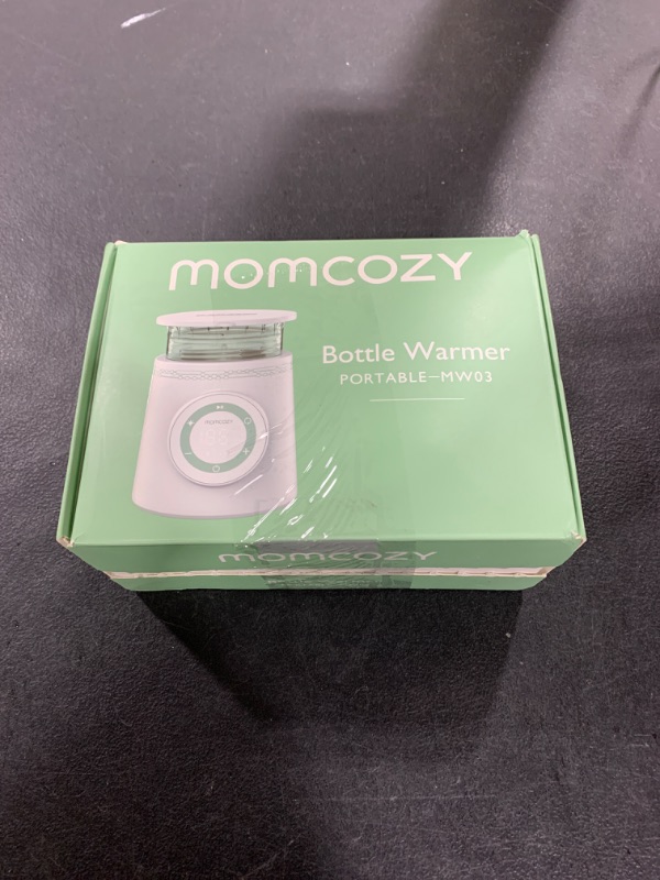Photo 1 of Momcozy Portable Bottle Warmer for Travel, Double Leak-Proof Travel Bottle Warmer with Fast Heating, Safety Material Baby Bottle Warmer for Dr. Brown, Philips Avent, Medela, Tommee Tippee, Comotomo