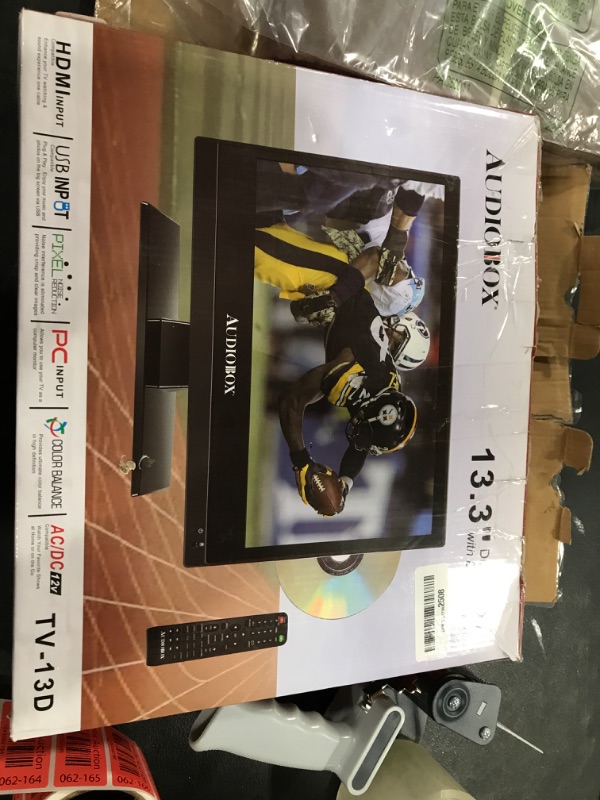 Photo 1 of Audiobox 13.3" HDTV with Built-in DVD Player with HDMI, USB, Car Cord Adapter and Digital Noise Reduction, Compact TV Television RV, Camping, Outdoors
