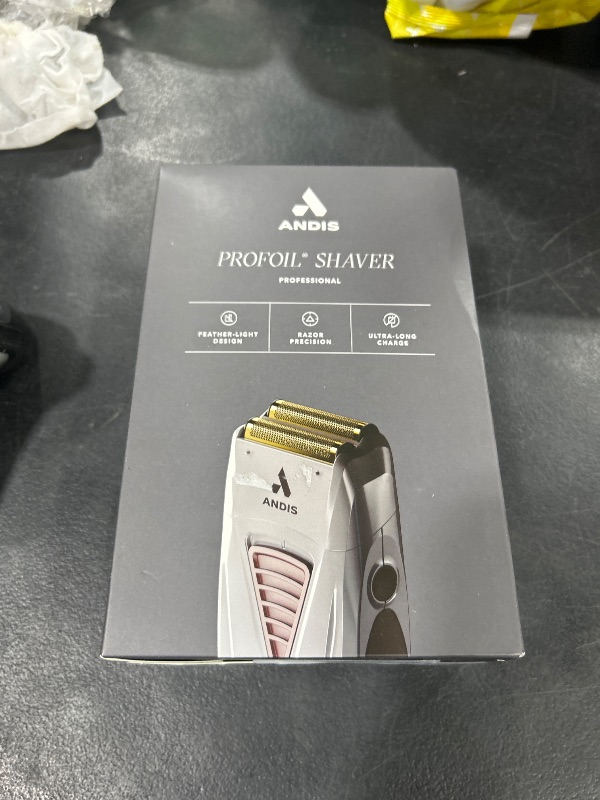 Photo 1 of Andis TS-1 17235 Pro Foil Lithium Titanium Foil Shaver, Cord/Cordless, Smooth Shaving Cordless Shaver with Charger, Gray