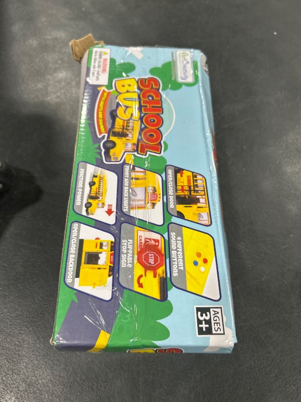 Photo 1 of ArtCreativity Yellow School Bus Toy with Flashing Lights & Sound, Friction Powered 1/16 Scale School Bus Toy for Kids with 4 Sounds & Lights, Back & Side Doors Open, Easter Gifts for Kids Ages 3+