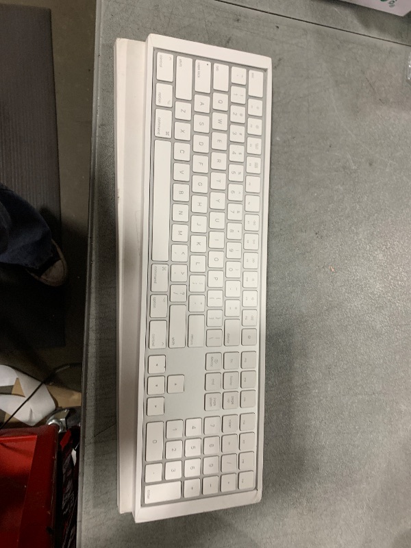 Photo 1 of Apple Magic Keyboard with Numeric Keypad: Wireless, Bluetooth, Rechargeable. Works with Mac, iPad, or iPhone; US English - White