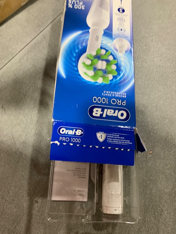 Photo 1 of Oral-B Pro 1000 Rechargeable Electric Toothbrush, White