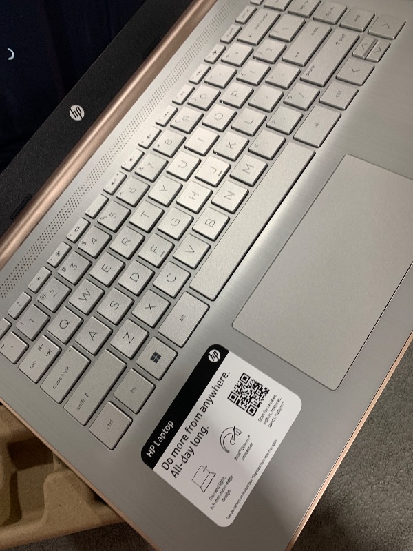 Photo 1 of HP 14 Laptop, Intel Celeron N4020, 4 GB RAM, 64 GB Storage, 14-inch HD Touchscreen, Windows 11 Home, Thin & Portable, 4K Graphics, One Year of Microsoft 365 (14-dq0070nr, 2021, Pale Rose Gold)