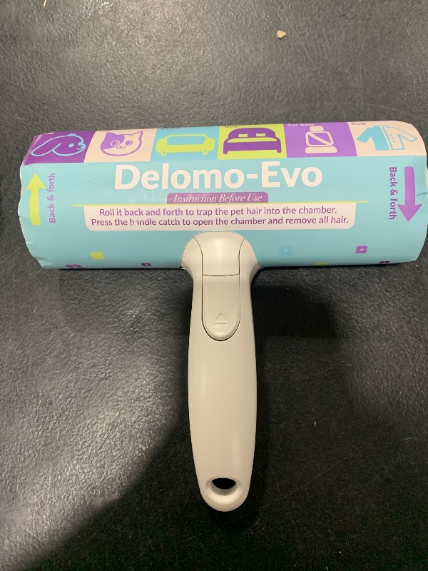 Photo 1 of DELOMO Pet Hair Remover - Lint Roller for Pet Hair - Cat and Dog Hair Remover for Couch, Furniture, Carpet, Car Seat, Reusable Roller with Self-Cleaning Base - Upgraded Animal Fur Removal Tool