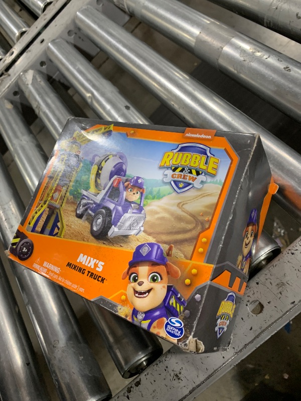 Photo 1 of Rubble & Crew, Mix’s Cement Mixer Toy Truck with Action Figure and Movable Construction Toys, Kids Toys for Ages 3 and Up