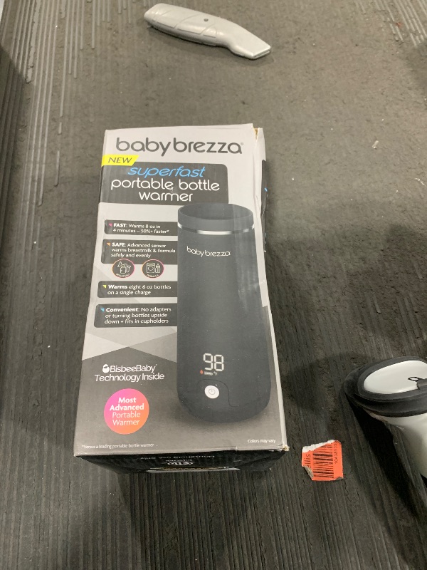 Photo 1 of Baby Brezza Superfast Portable Baby Bottle Warmer – 67% Faster - Travel Breastmilk Warmer and Formula Warmer - Safe, Even Heating - Up to 9oz - No Adapters, Black
