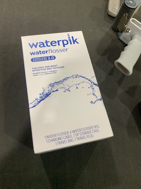 Photo 1 of Waterpik Cordless Advanced 2.0 Water Flosser For Teeth, Gums, Braces, Dental Care With Travel Bag and 4 Tips, ADA Accepted, Rechargeable, Portable, and Waterproof, Blue WP-583, Packaging May Vary