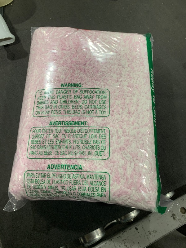 Photo 1 of pink rug 