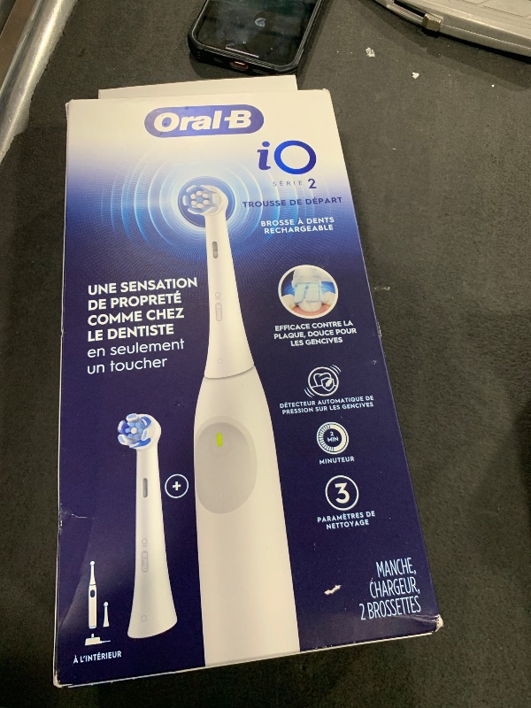 Photo 1 of Oral-B iO Series 2 Rechargeable Electric Powered Toothbrush Starter Kit, Pure White with 2 Brush Heads - Automatic Pressure Sensor to Protect Gums - 3 Modes - 2 Min Timer