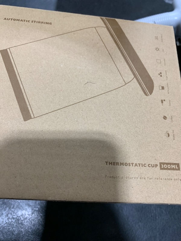 Photo 1 of Self Stirring Coffee Mug - Dual Function Temperature Control Mug for Stirring & Heating- Smart Heated Mug for Coffee with Lid, Extra Stirring Pill & Charger- Electric Coffee Cup in a Gift Box-Black