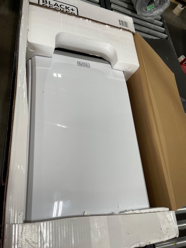 Photo 1 of BLACK+DECKER 12,000 BTU Portable Air Conditioner with Heat and Remote Control, White