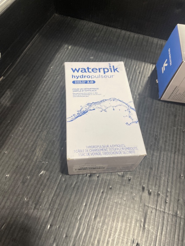 Photo 1 of Waterpik Cordless Advanced 2.0 Water Flosser For Teeth, Gums, Braces, Dental Care With Travel Bag and 4 Tips, ADA Accepted, Rechargeable, Portable, and Waterproof, White WP-580, Packaging May Vary