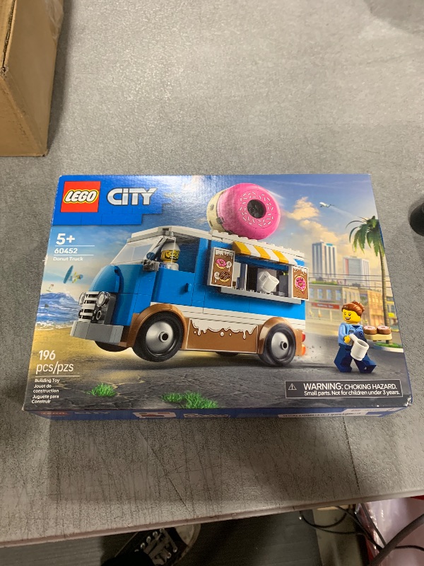 Photo 1 of LEGO City Donut Truck Toy - Building Toy for Kids, Boys and Girls, Ages 5+ - Birthday Gift for Kids Mobile Donut Stand with 2 Minifigures and Other Accessories - 60452