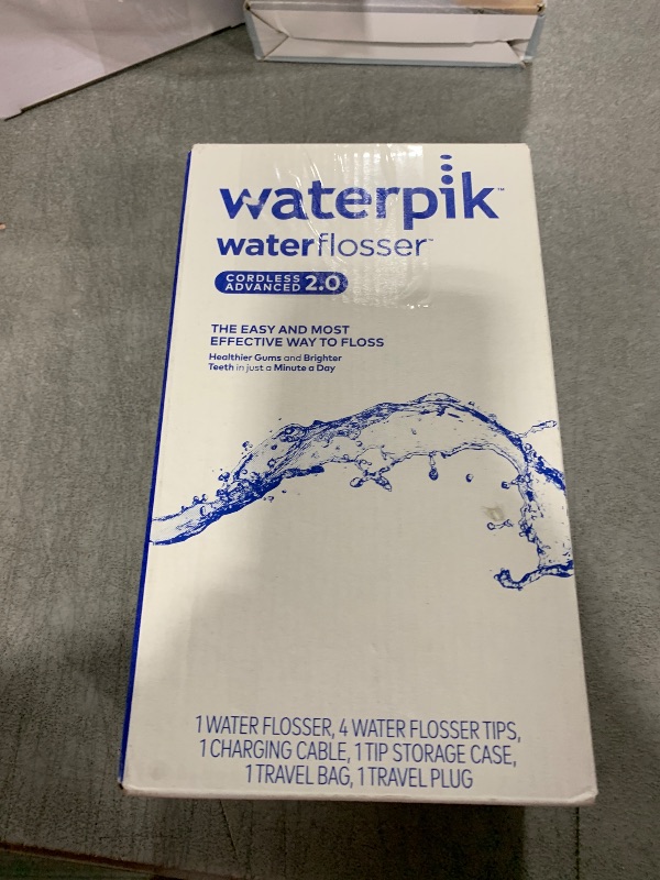 Photo 1 of Waterpik Cordless Advanced 2.0 Water Flosser For Teeth, Gums, Braces, Dental Care With Travel Bag and 4 Tips, ADA Accepted, Rechargeable, Portable, and Waterproof, White WP-580, Packaging May Vary