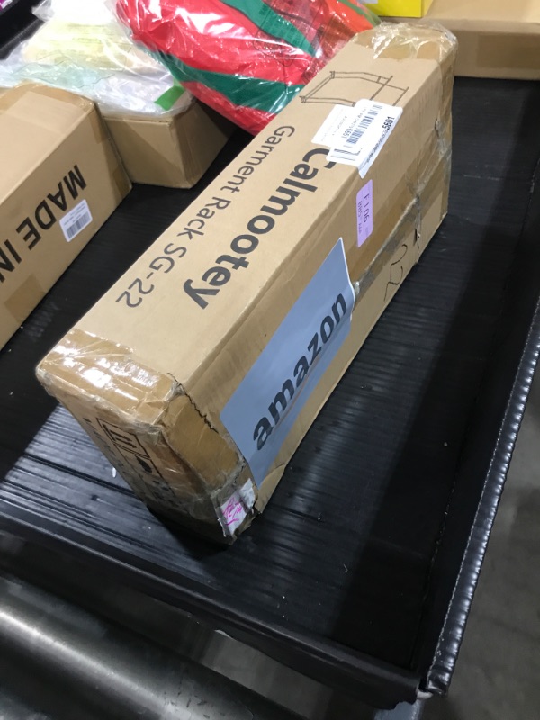 Photo 1 of Calmootey Double Rod Clothing Garment Rack,Rolling Hanging Clothes Rack,Portable Clothes Organizer for Bedroom,Living Room,Clothing Store,Black