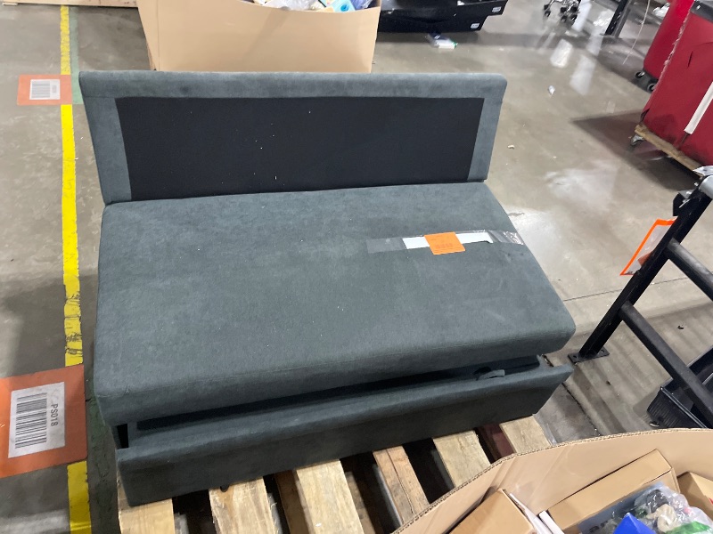 Photo 1 of Two pieces of a sectional fold out couch 