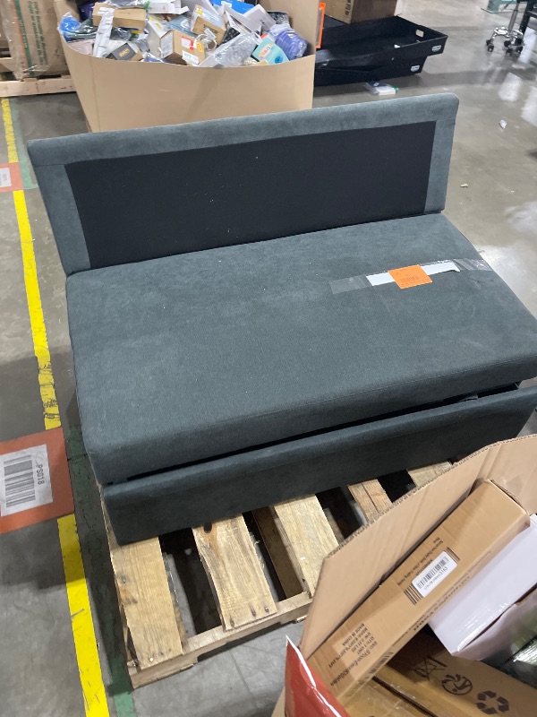 Photo 1 of Two pieces of a sectional fold out couch 