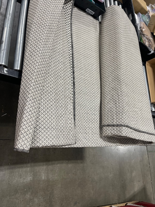 Photo 1 of outdoor patio rug unknown size 