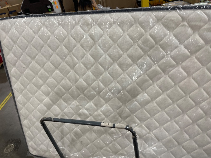 Photo 1 of queen sized mattress 