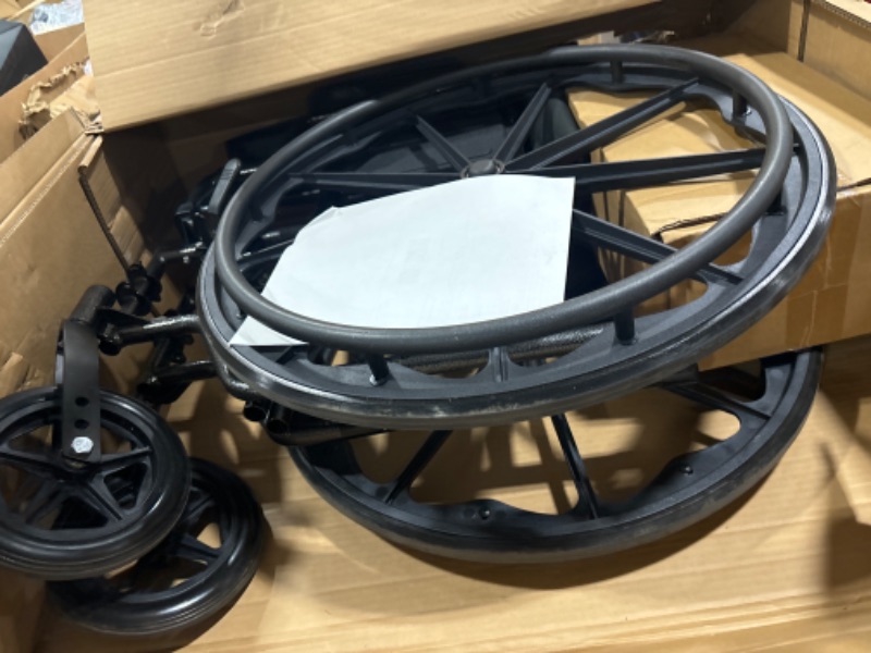 Photo 1 of Medline Comfortable Folding Wheelchair with Swing-Back, Desk-Length Arms and Elevating Footrests, 18”W x 16”D Seat