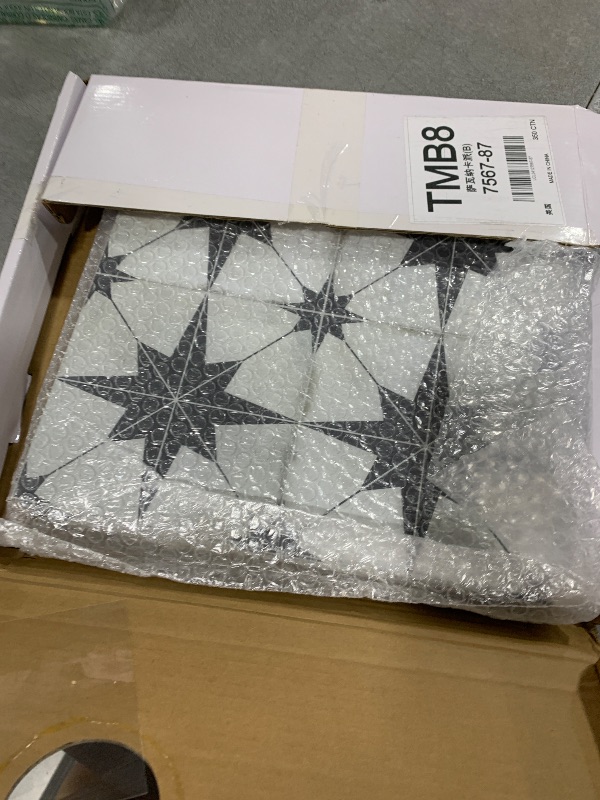 Photo 1 of The Tiles Plaza Peel and Stick Encaustic Backsplash, Black Star Patterned Stick on Tile, Self-Adhesive Wall Tile Sticker for Kitchen Bathroom Fireplace Stairs, 10 Sheets