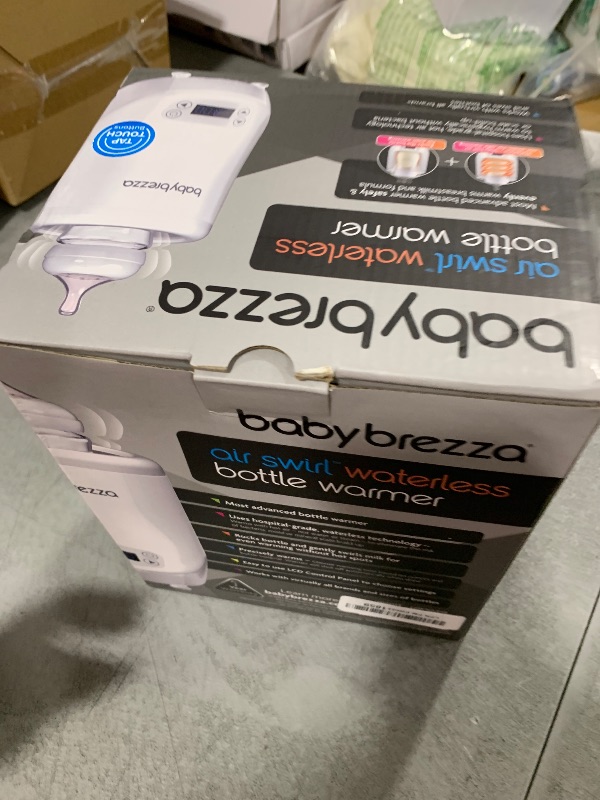 Photo 1 of Baby Brezza AirSwirl Waterless Baby Bottle Warmer - Safely Warm Breastmilk + Formula - Bottles Stay Dry + Nutrients are Protected - Works with Nearly All Bottles