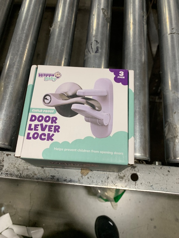 Photo 1 of Door Lever Lock (3 Pack) Prevents Toddlers from Opening Doors. 3.25" L * 1.5" W * 4.5" H Easy One Hand Operation for Adults. Durable ABS with 3M Adhesive Backing. Simple Install, No Tools Needed.
