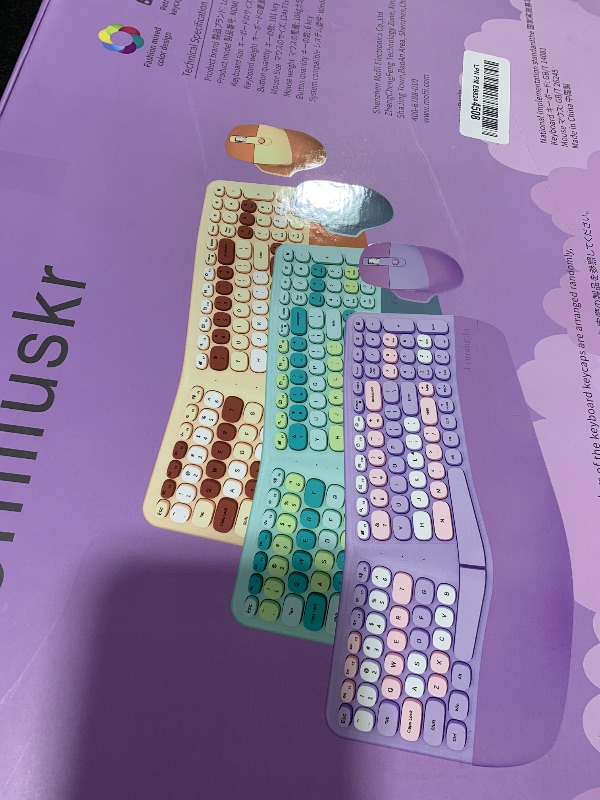 Photo 1 of Wireless Ergonomic Keyboard and Mouse Combo with PU Wrist Rest, Carpal Tunnel Keyboard, 2.4G Colorful Split Ergo Keyboard, Comfortable Natural Typing, Compatible with PC/Laptop (Purple)