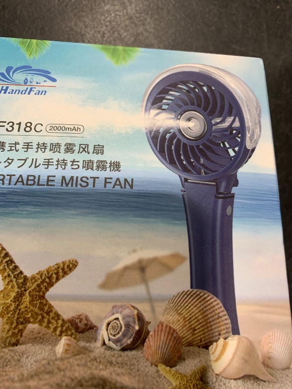 Photo 1 of HandFan Upgraded Portable Handheld Misting Fan, Rechargeable Personal Mister Fan, Battery Operated Spray Water Mist Fans, Foldable Mini Cooling Hand Fans for Beach Travel Outdoors(Royal Blue)