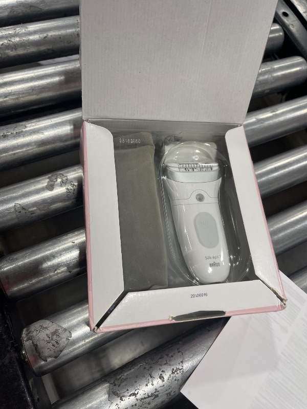 Photo 1 of Braun Epilator Silk-épil 7, Hair Removal Device, Women Shaver & Trimmer, Wet and Dry, Wide Head, Includes Shaver Head and Trimmer Comb, SE7-041, Silver