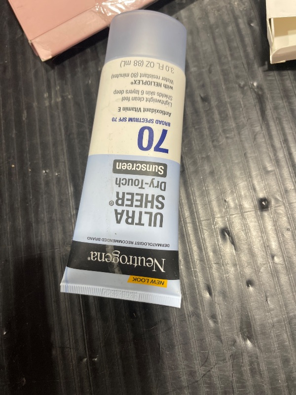 Photo 1 of Neutrogena Ultra Sheer Dry-Touch Water Resistant and Non-Greasy Sunscreen Lotion with Broad Spectrum SPF 70, 3 Fl Oz (Pack of 1)