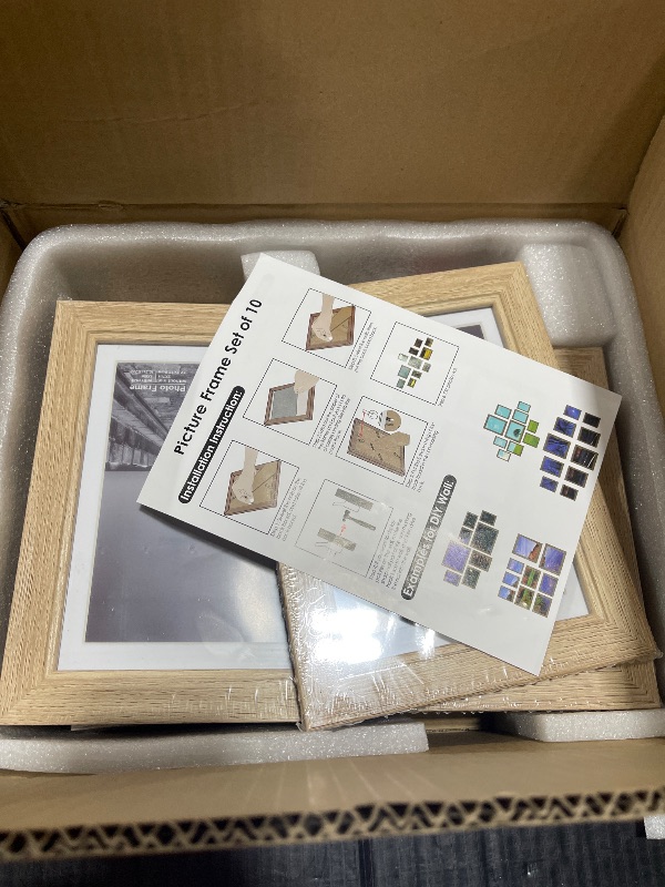 Photo 1 of Povrgive 10 Pack Picture Frames Collage Wall Decor - Gallery Wall Frame Set with Mat for Wall Mounting or Tabletop Display, Including Two 8x10, Four 5x7, Four 4x6 Photo Frames, Real Glass