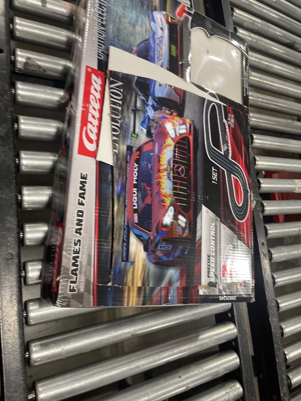 Photo 1 of Carrera Evolution Analog Electric 1:32 Scale Slot Car Racing Track Set - Includes Two 1:32 Scale Cars & Two Dual-Speed Controllers Ages 8+, Flames and Fame