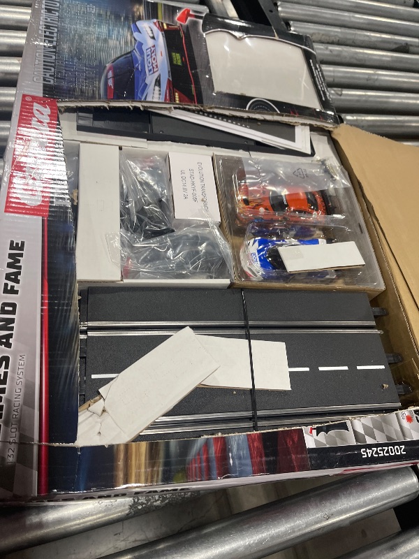 Photo 1 of Carrera Evolution Analog Electric 1:32 Scale Slot Car Racing Track Set - Includes Two 1:32 Scale Cars & Two Dual-Speed Controllers Ages 8+, Flames and Fame