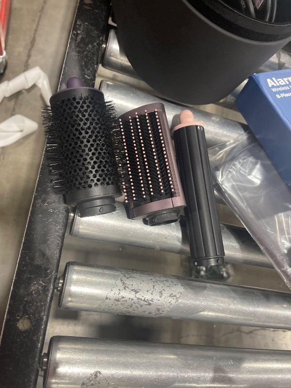 Photo 1 of Limited Edition Dyson Airwrap i.d.™ Multi-Styler and Dryer Straight+Wavy in Jasper Plum