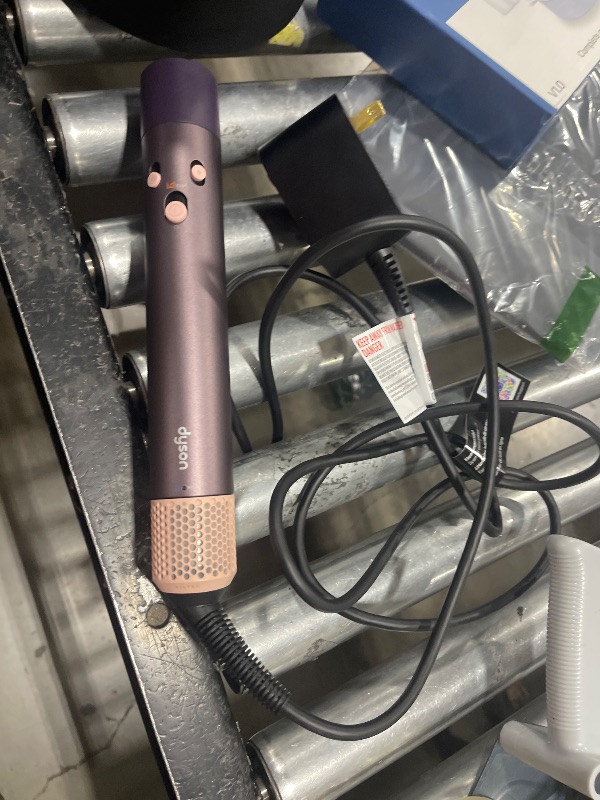 Photo 1 of Limited Edition Dyson Airwrap i.d.™ Multi-Styler and Dryer Straight+Wavy in Jasper Plum