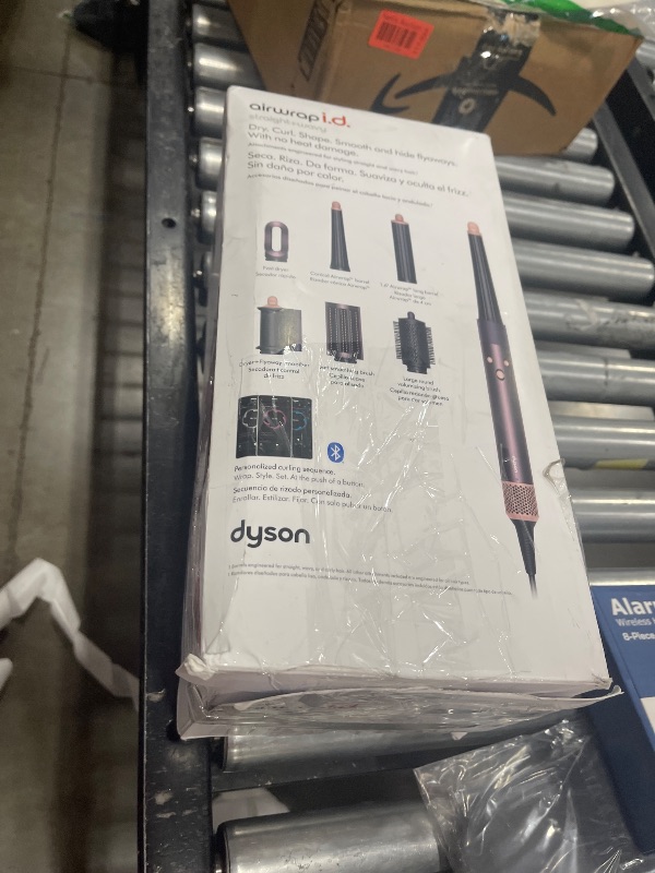 Photo 1 of Limited Edition Dyson Airwrap i.d.™ Multi-Styler and Dryer Straight+Wavy in Jasper Plum