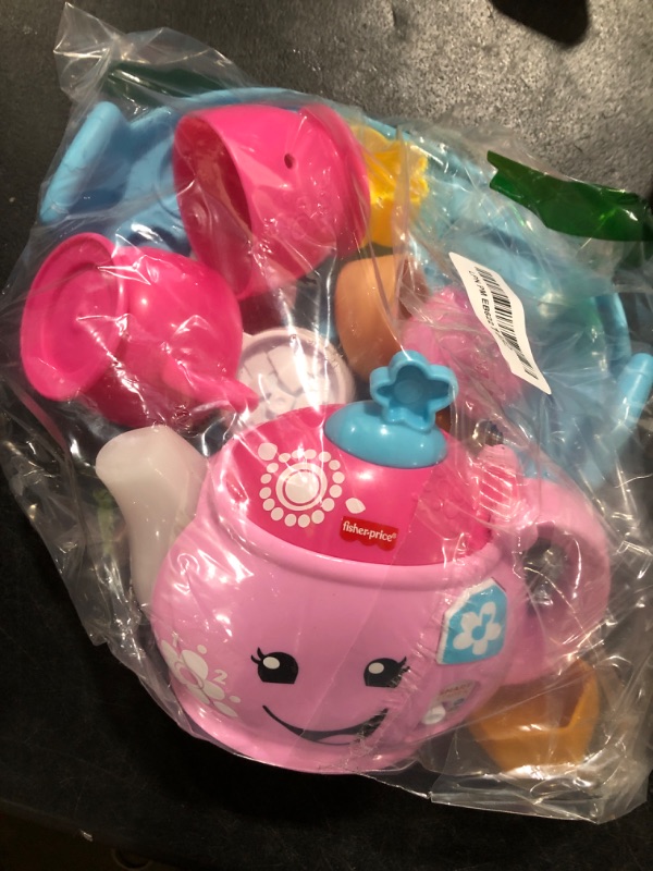 Photo 1 of Fisher-Price Toddler Toy Laugh & Learn Sweet Manners Tea Set with Smart Stages Learning Songs for Pretend Play Kids Ages 18+ Months