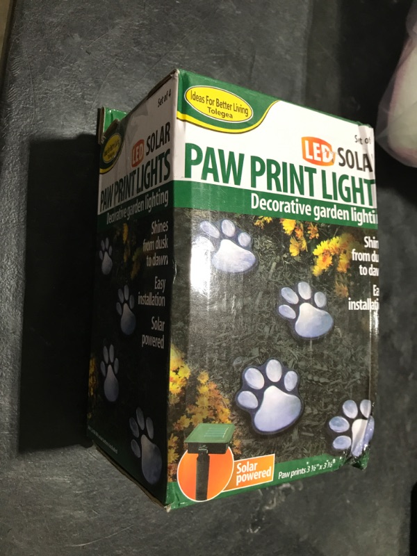 Photo 1 of YOVECATHOU 4 Solar Dog Animal Paw Print Lights Garden Statue Lantern Led Path 3" Light Lamp for Pathway,Lawn,Yard,Outdoor Decorations (Colorful)