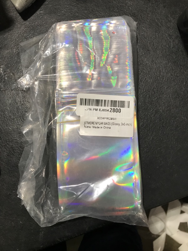 Photo 1 of JETMORE 100 pcs Mylar Bags, Resealable Holographic Bags, Sealable Packaging Bags for Small Business, Freshie Supplies, Candy Sample Jewelry Product Bag, Foil Pouch (3×5 Inch, Holographic)