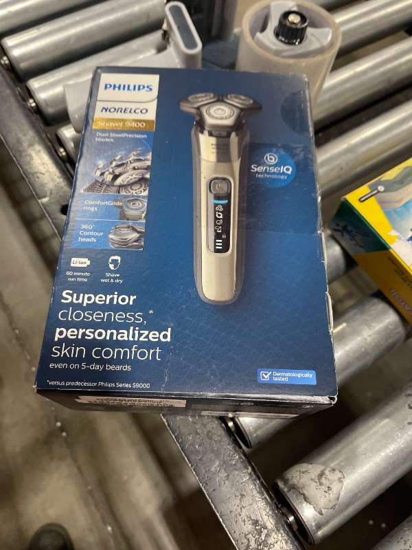 Photo 1 of Philips Norelco 9400 Rechargeable Wet/Dry Electric Shaver with SenseIQ and Comfort Glide Ring Technology, Battery Powered, Silver, S9502/83
