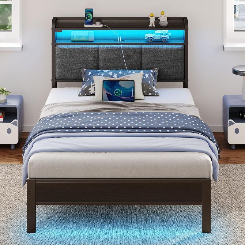 Photo 1 of Rolanstar Bed Frame Twin Size with Charging Station and LED Lights, Upholstered Headboard with Storage Shelves, Heavy Duty Metal Slats, No Box Spring Need, Noise Free, Easy Assembly, Dark Grey
