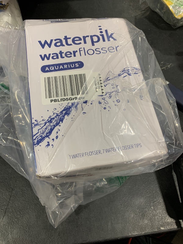 Photo 1 of Waterpik Aquarius Water Flosser For Teeth Cleaning, Gums, Braces, Dental Care, Electric Power With 10 Settings, 7 Tips For Multiple Users And Needs, ADA Accepted, White WP-660, Packaging May Vary