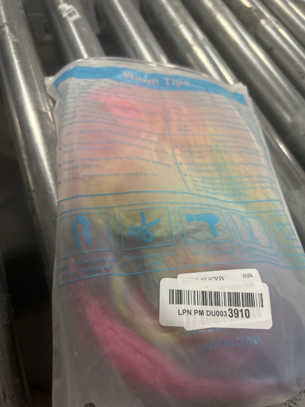 Photo 1 of BERON Rainbow Ombre Wigs Long Wavy Wig for Women Colorful Ombre Curly Heat Resistant Synthetic Hair Wigs for Daily Use with Wig Cap