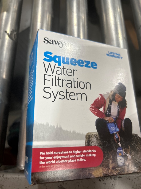 Photo 1 of Sawyer Products SP129 Squeeze Water Filtration System w/ Two 32-Oz Squeeze Pouches, Straw, and Hydration Pack Adapter