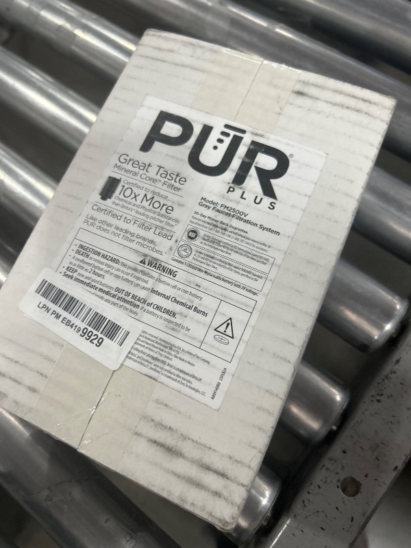 Photo 1 of PUR PLUS Vertical Faucet Mount Water Filtration System, Lead-Reducing Filter, Great-Tasting Water, Easy Install, Lasts 100 Gallons, Compatible with Sinks with External Aerators, Grey